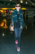DAKOTA JOHNSON at JFK Airport in New York 11/02/2015
