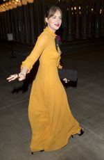 DAKOTA JOHNSON Leaves LACMA Art and Film Gala in Los Angeles 11/07/2015