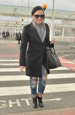 DEMI LOVATO at Heathrow Airport in London 11/09/2015