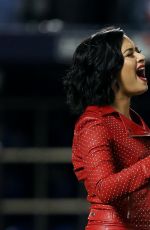 DEMI LOVATO Sings National Anthem at MLB World Series Game Four at The Citi Field in New York 10/31/2015