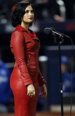 DEMI LOVATO Sings National Anthem at MLB World Series Game Four at The Citi Field in New York 10/31/2015
