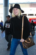 ELLE FANNING Arrives at Los Angeles International Airport 11/04/2015