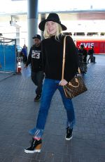 ELLE FANNING Arrives at Los Angeles International Airport 11/04/2015