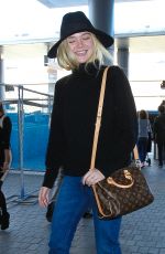 ELLE FANNING Arrives at Los Angeles International Airport 11/04/2015