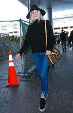 ELLE FANNING Arrives at Los Angeles International Airport 11/04/2015