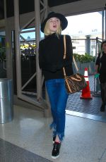 ELLE FANNING Arrives at Los Angeles International Airport 11/04/2015