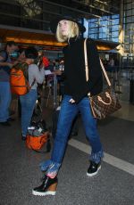 ELLE FANNING Arrives at Los Angeles International Airport 11/04/2015