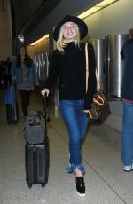 ELLE FANNING Arrives at Los Angeles International Airport 11/04/2015