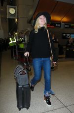 ELLE FANNING Arrives at Los Angeles International Airport 11/04/2015