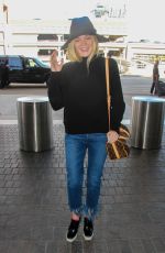 ELLE FANNING Arrives at Los Angeles International Airport 11/04/2015