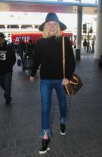 ELLE FANNING Arrives at Los Angeles International Airport 11/04/2015