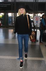 ELLE FANNING Arrives at Los Angeles International Airport 11/04/2015