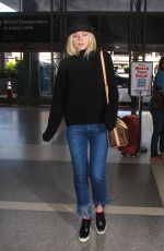ELLE FANNING Arrives at Los Angeles International Airport 11/04/2015