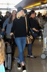 ELLE FANNING Arrives at Los Angeles International Airport 11/04/2015