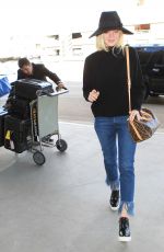 ELLE FANNING Arrives at Los Angeles International Airport 11/04/2015