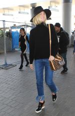 ELLE FANNING Arrives at Los Angeles International Airport 11/04/2015