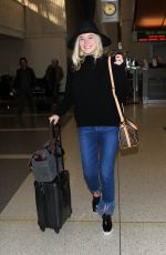 ELLE FANNING Arrives at Los Angeles International Airport 11/04/2015