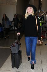 ELLE FANNING Arrives at Los Angeles International Airport 11/04/2015