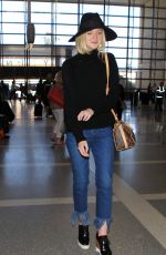 ELLE FANNING Arrives at Los Angeles International Airport 11/04/2015