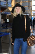 ELLE FANNING Arrives at Los Angeles International Airport 11/04/2015