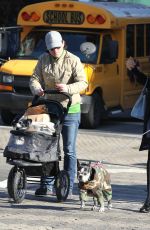 FAMKE JANSSEN Walks Her Dog Out in New York 11/24/2015
