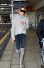 GIGI HADID at Heathrow Airport in London 11/30/2015