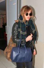 DAKOTA JOHNSON Arrives at Los Angeles International Airport 11/02/2015