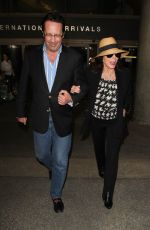 JOAN COLLINS at Los Angeles International Airport 11/05/2015