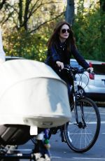 JULIANNE MOORE and ELIZABETH BANKS Take Ride on Bicycle 11/03/2015
