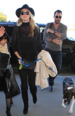 KATE UPTON Arrives at Los Angeles International Airport 11/23/2015