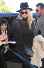 KATE UPTON Arrives at Los Angeles International Airport 11/23/2015