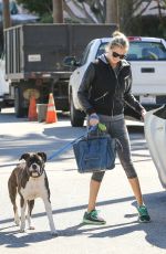 KATE UPTON Walks Her Dog Out in Beverly Hills 11/17/2015