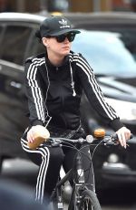 KATY PERRY Riding Her Bike Out in New York 11/06/2015