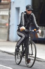 KATY PERRY Riding Her Bike Out in New York 11/06/2015