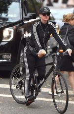 KATY PERRY Riding Her Bike Out in New York 11/06/2015