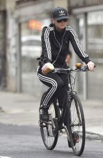 KATY PERRY Riding Her Bike Out in New York 11/06/2015