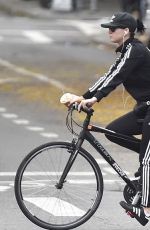 KATY PERRY Riding Her Bike Out in New York 11/06/2015