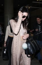 KENDALL and KYLIE JEENER Arrives at LAX AIrport in Los Angeles 11/19/2015