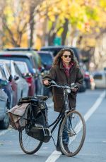 KERI RUSSELL Riding a Bike Out in New York 11/25/2015