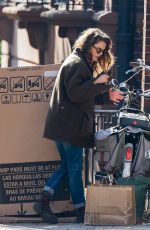 KERI RUSSELL Riding a Bike Out in New York 11/25/2015