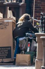 KERI RUSSELL Riding a Bike Out in New York 11/25/2015