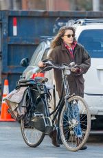 KERI RUSSELL Riding a Bike Out in New York 11/25/2015