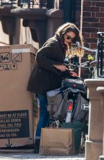 KERI RUSSELL Riding a Bike Out in New York 11/25/2015