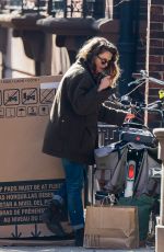 KERI RUSSELL Riding a Bike Out in New York 11/25/2015