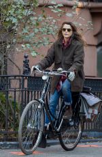 KERI RUSSELL Riding a Bike Out in New York 11/25/2015