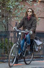 KERI RUSSELL Riding a Bike Out in New York 11/25/2015