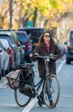 KERI RUSSELL Riding a Bike Out in New York 11/25/2015