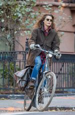 KERI RUSSELL Riding a Bike Out in New York 11/25/2015
