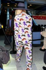 KESHA Arrives at LAX Airport in Los Angeles 11/25/2015