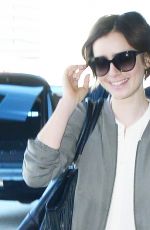 LILY COLLINS Arrives at LAX Airport in Los Angeles 11/08/2015